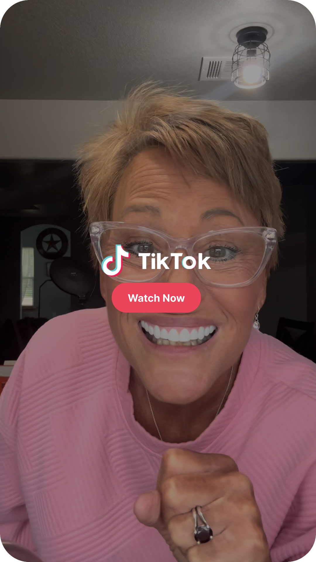 Older woman smiling after enhancing her smile with Imako® Cosmetic Teeth.